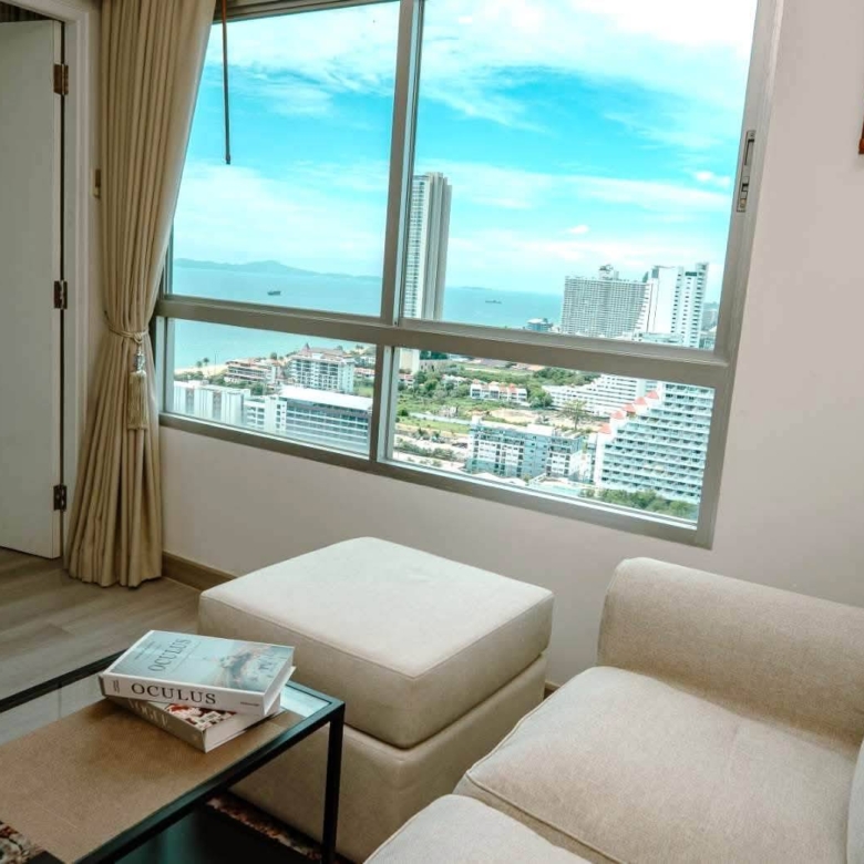 Urgent sale: High-floor 2-bedroom condo with a sea view
