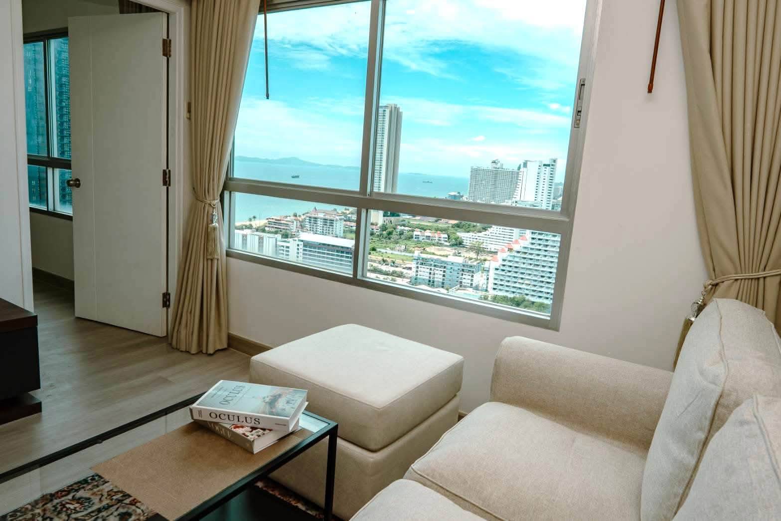 Urgent sale: High-floor 2-bedroom condo with a sea view